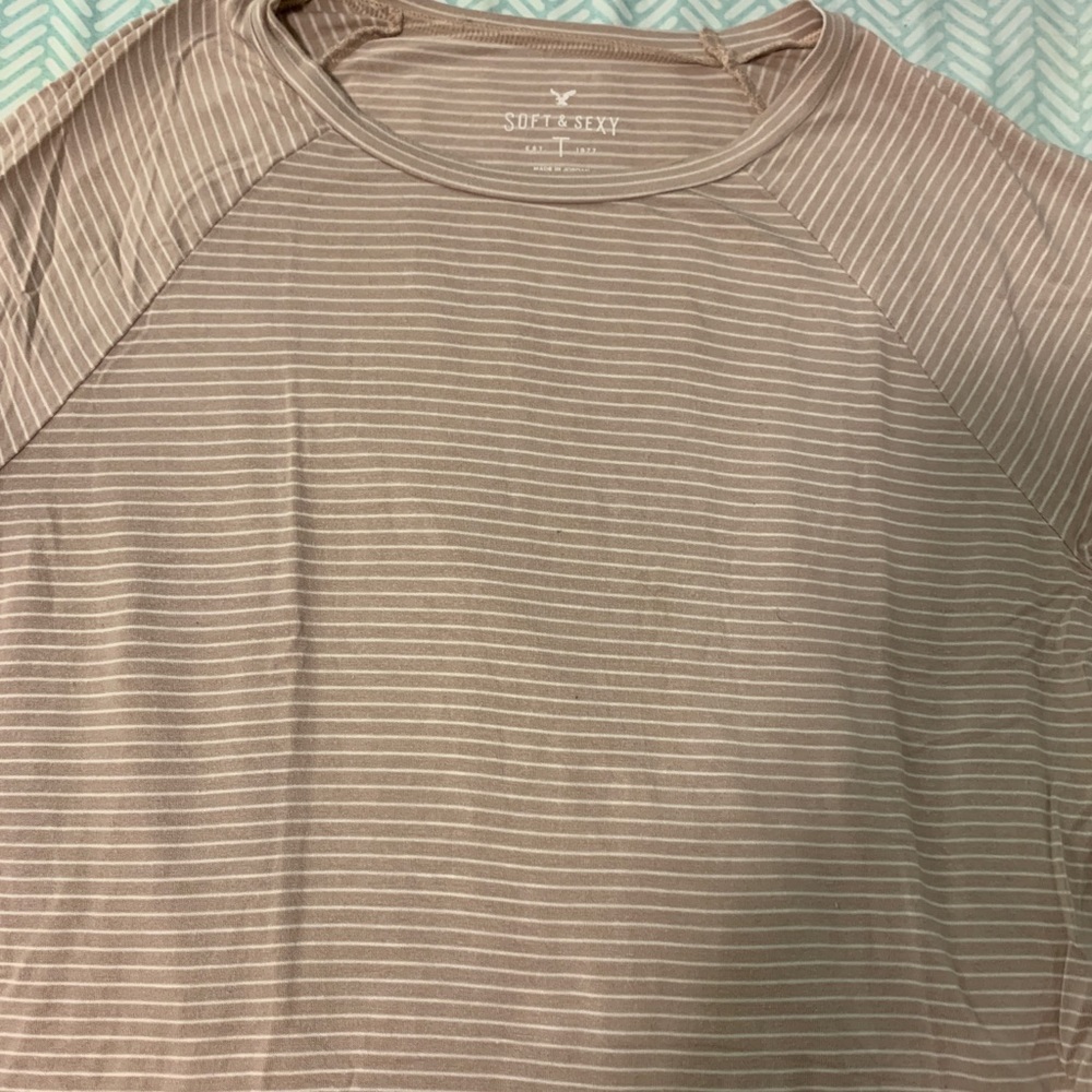 Soft and sexy pink T-shirt with white stripes
